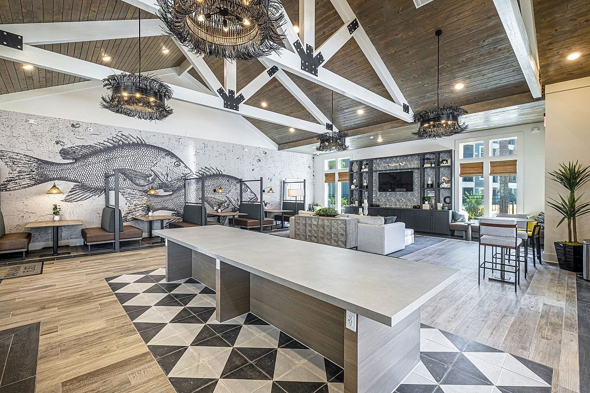 clubhouse room with living room and dining area